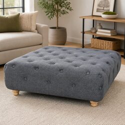 Enhance Your Space with a Grey Upholstered Pouffe