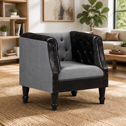 Enhance Your Space with This Black Leather Tub Chair