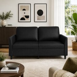 Enhance Your Living Space with a Chic Black Sofa