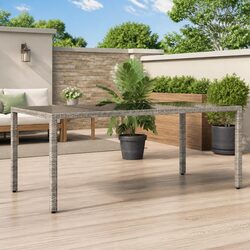 Elevate Your Outdoor Space with Our Grey Glass Top Garden Table