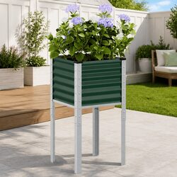Enhance Your Outdoor Space with a Green Planter Box