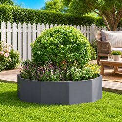 Elevate Your Outdoor Space with this Round Garden Planter
