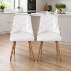 Enhance Your Dining Space with This Set of 4 White Dining Chairs
