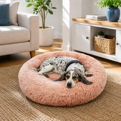 Comfortable Round Pink Dog Bed - Ideal for Resting Pets