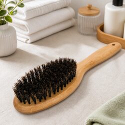 Eco-Friendly Bamboo Grooming Brush for a Clean Home